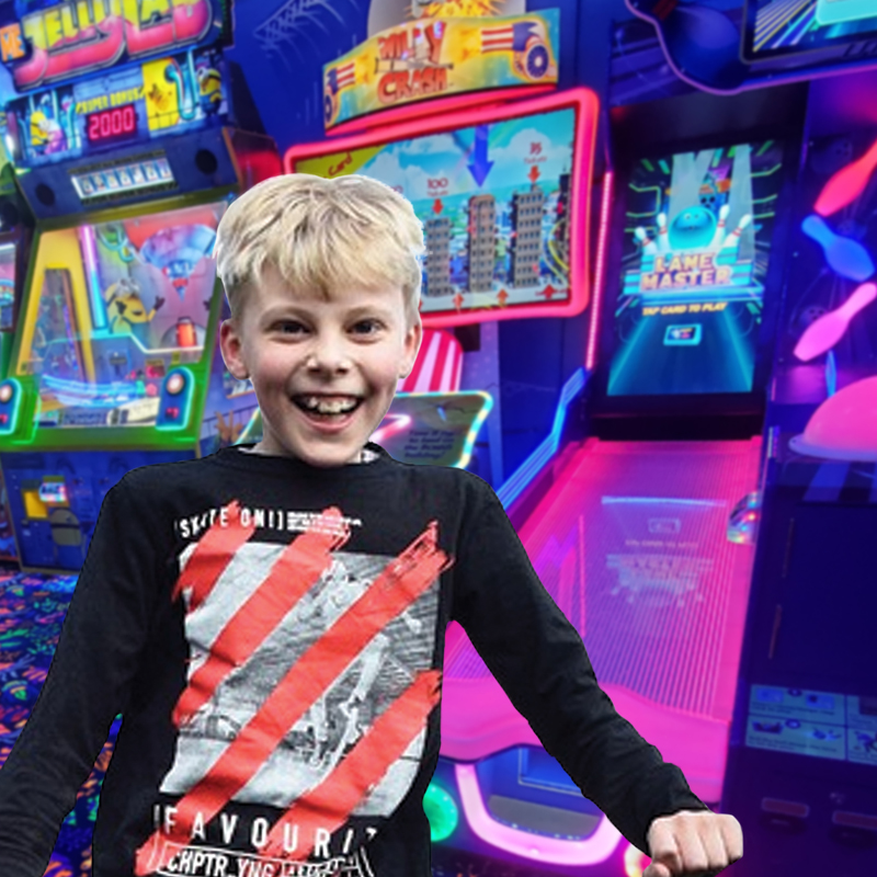 child ready for fun in arcade